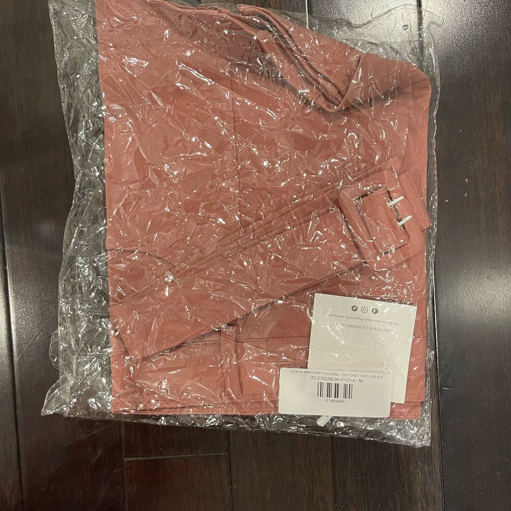 NEVER BEEN OPENED!!! BRAND NEW FUCHSIA SKIRT!!!! super cute!